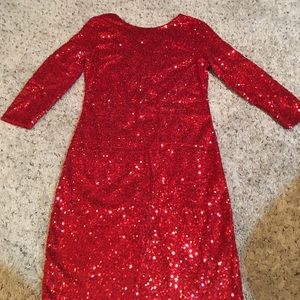Sequin red dress , tags says L but it fits Small